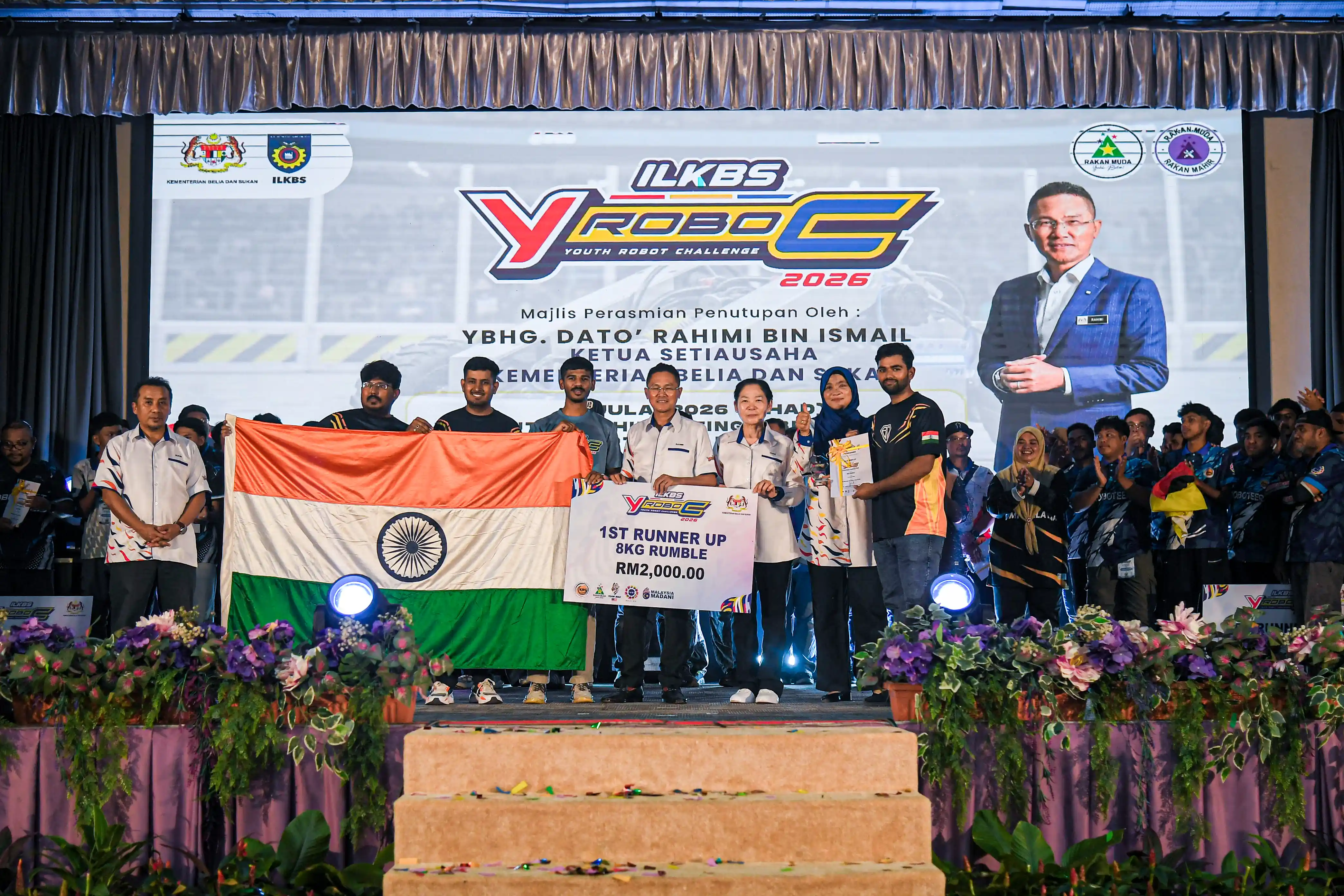 Black Diamond team with the Indian Flag at Y-RoboC 2026 Malaysia Podium